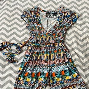 Super cute romper.